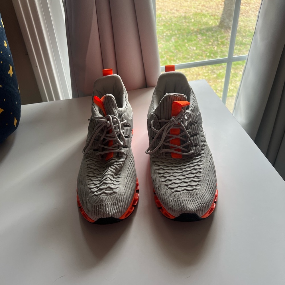 F19 Gray and Orange Athletic Shoes